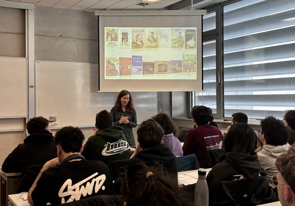 Tjaša Arčon giving a presentation about research of Cinderella motifs with AI to high school students